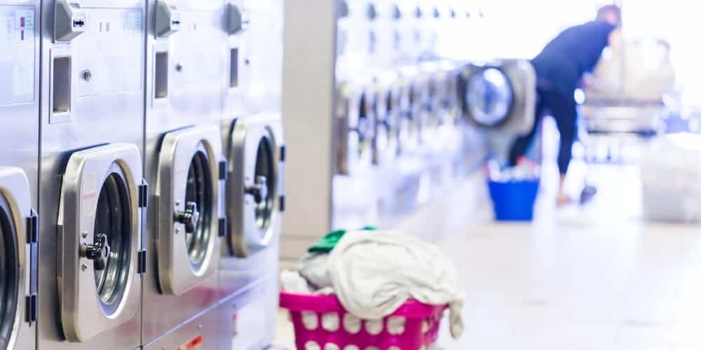 What are the maintenance requirements for laundromat machines?